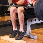 exercitii pentru gambe cu haltera pe genunchi